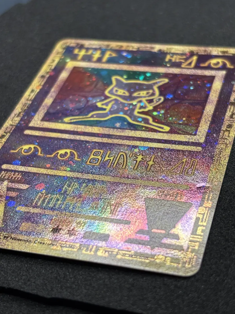 Pokemon card before restoration - heavy damage